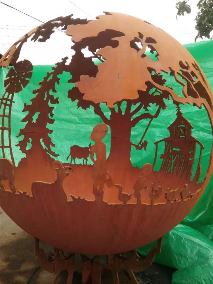 Fire Pit Sphere With Tree Branch Legs